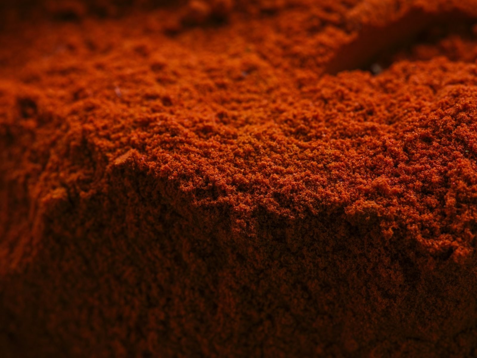 Close-up of vibrant red paprika powder