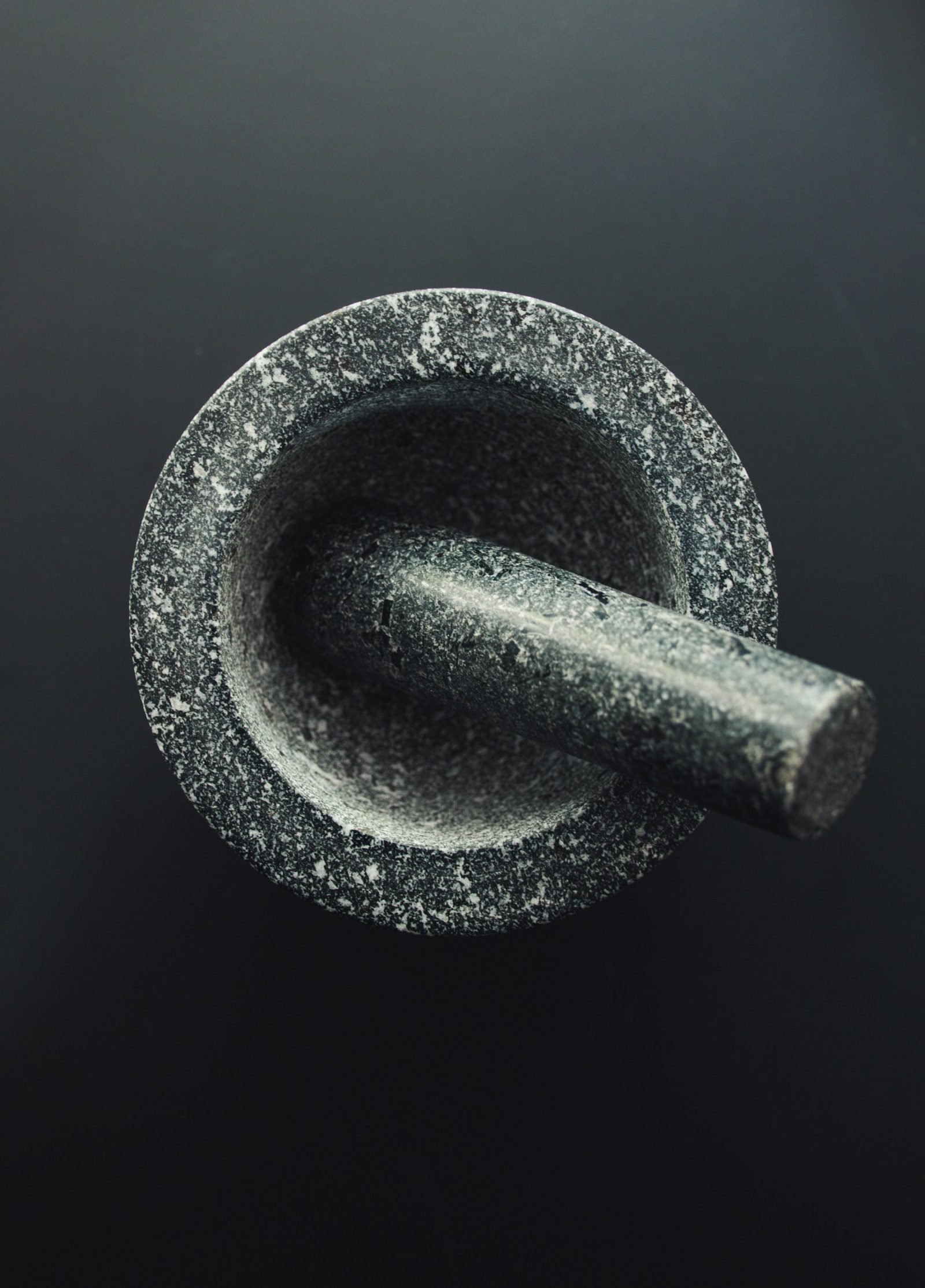 Black and grey stone mortar and pestle